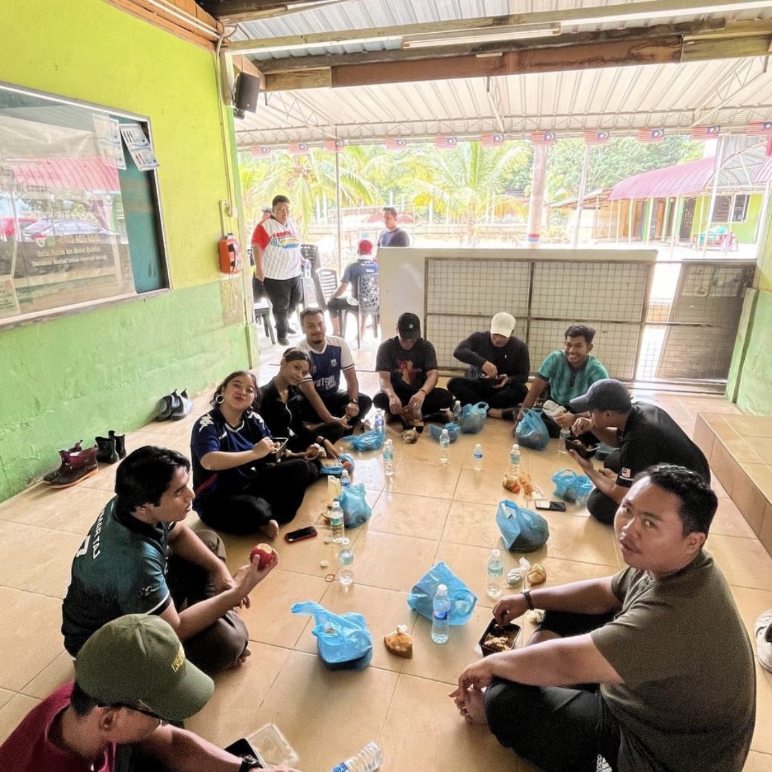Bella sharing a meal during a community activity